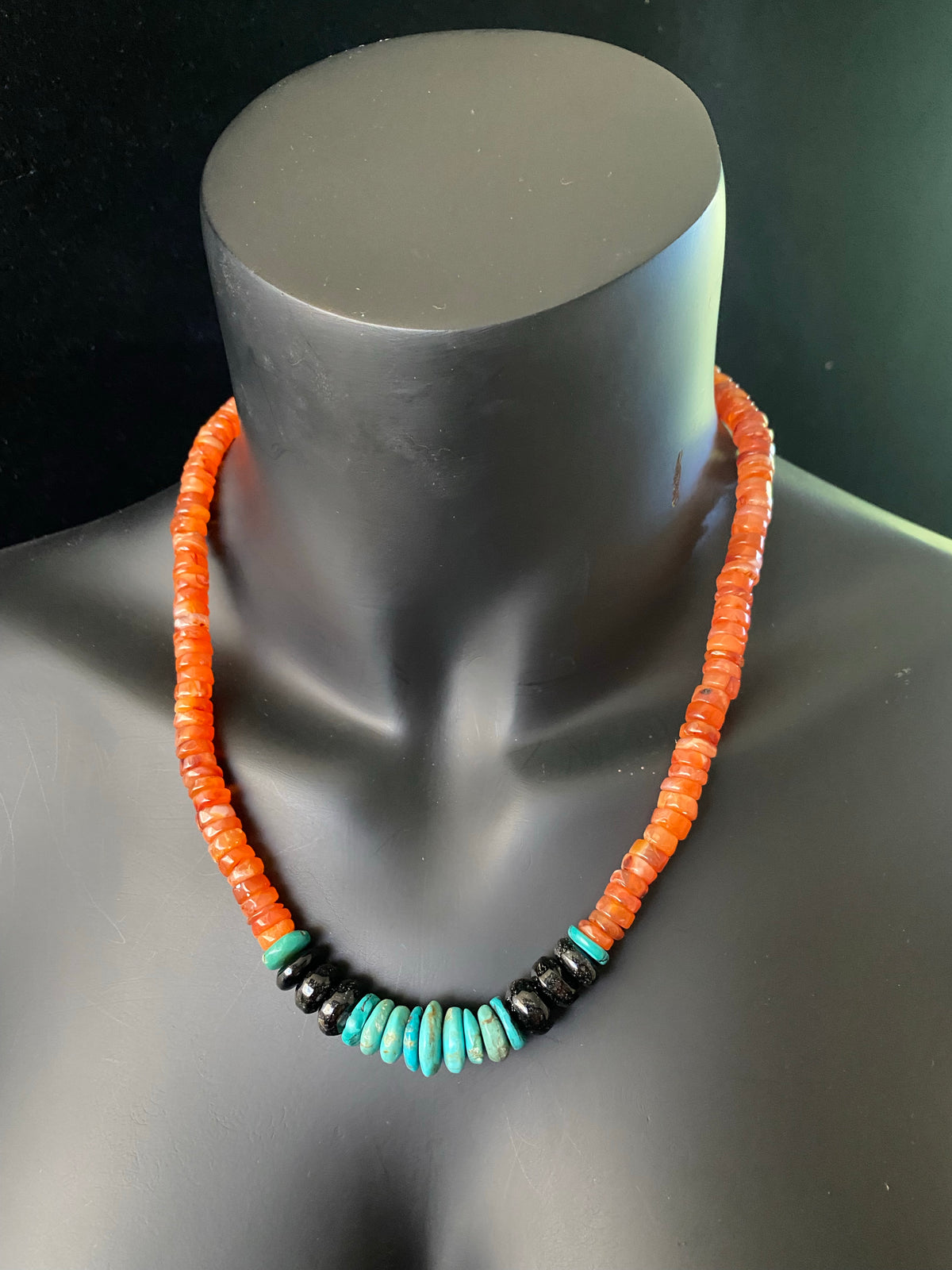 Chunky statement necklace with a southwest vibe, made from heshi cut carnelian beads, onyx and natural Arizona turquoise, finished with sterling silver beads and hook clasp. A one-off unisex necklace that will look stunning on a guy or girl. Measurements: 53 cm (21")