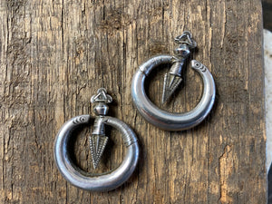 Medium pair of tribal silver earrings called Bent Arrow. Worn pushed sideways through the ear by Yao women. High grade silver, they can only be worn with an extended piercing