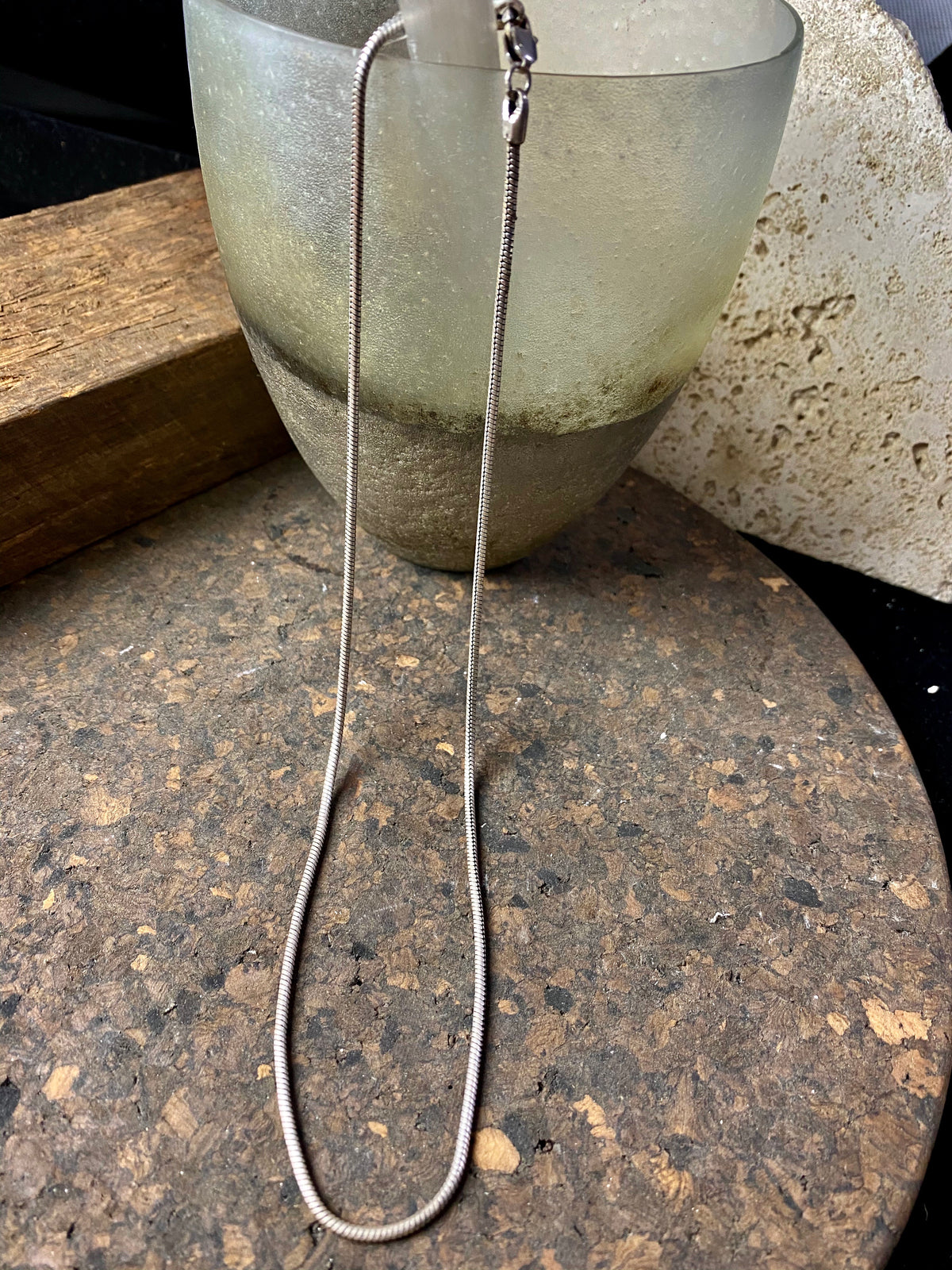 Open weave style silver snake chain, sterling silver, with a lobster claw clasp. Slightly oxidised to show the weave texture.