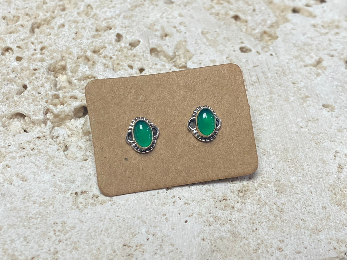 Small chrysoprase earring studs are hand made from sterling silver and set with clear green chrysoprase cabochons. A unisex earring
