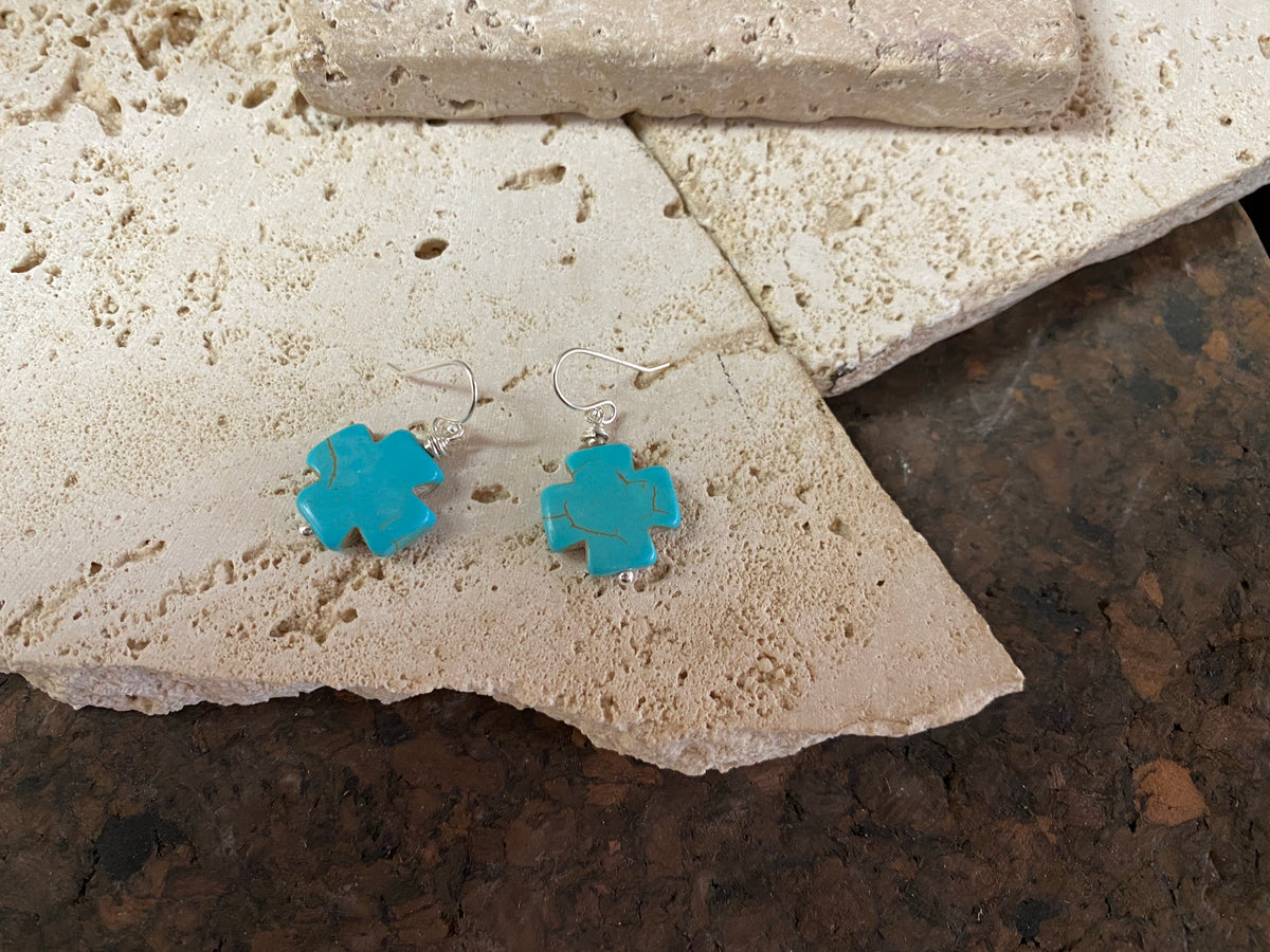 Striking cross earrings are hand crafted from sterling silver and blue dyed howlite stone, giving a southwest earring vibe without the price of real turquoise. Two styles, 3 or 3.5 cm length