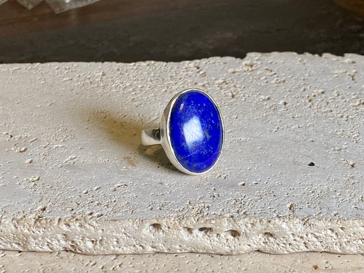 Lapis lazuli stone rings set in sterling silver. Each ring is unique, cut and mounted to showcase the beauty of the individual stones. The lapis is from Afghanistan, completely natural.