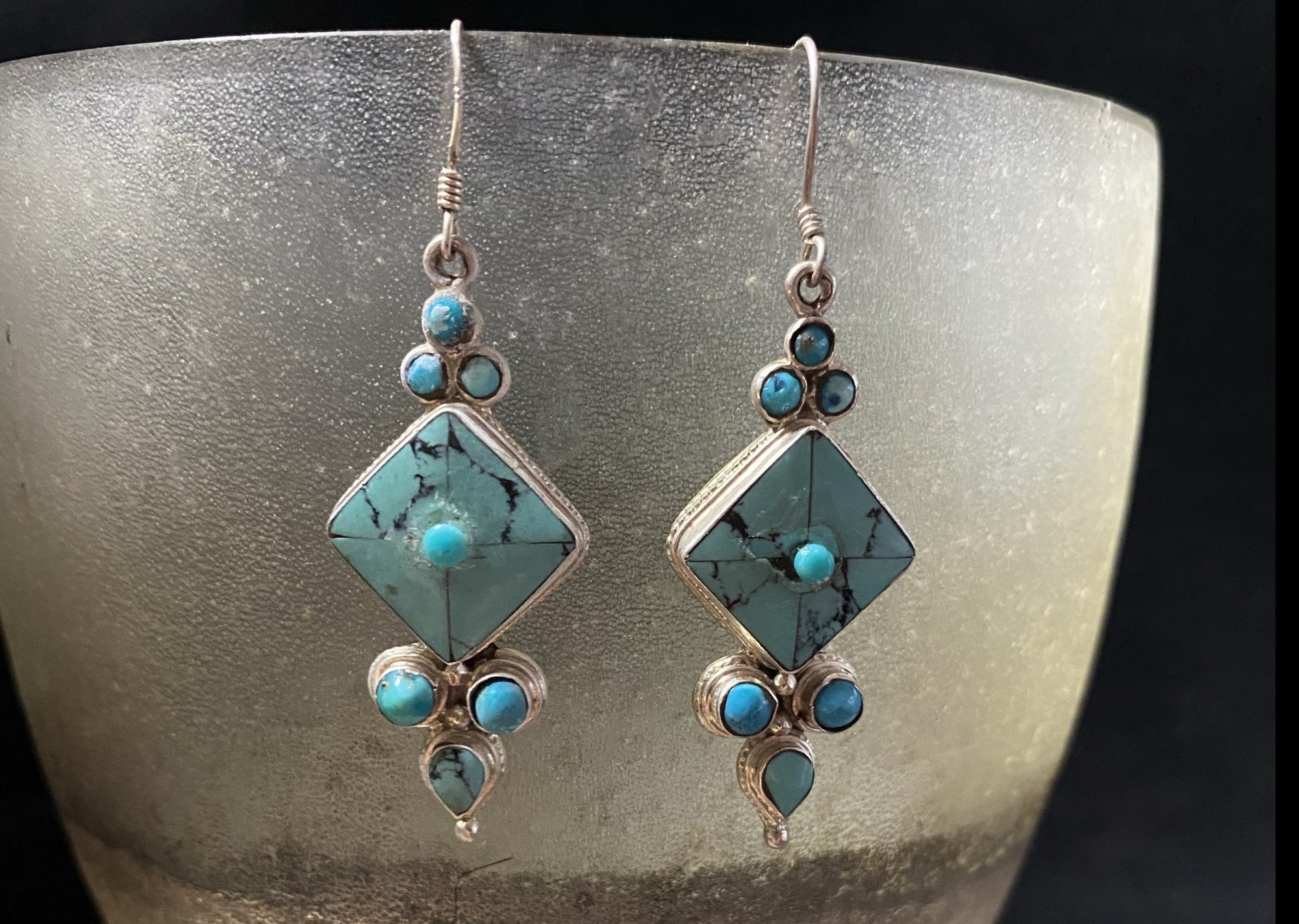 Classic Tibetan earrings, consisting of panels of turquoise set in silver