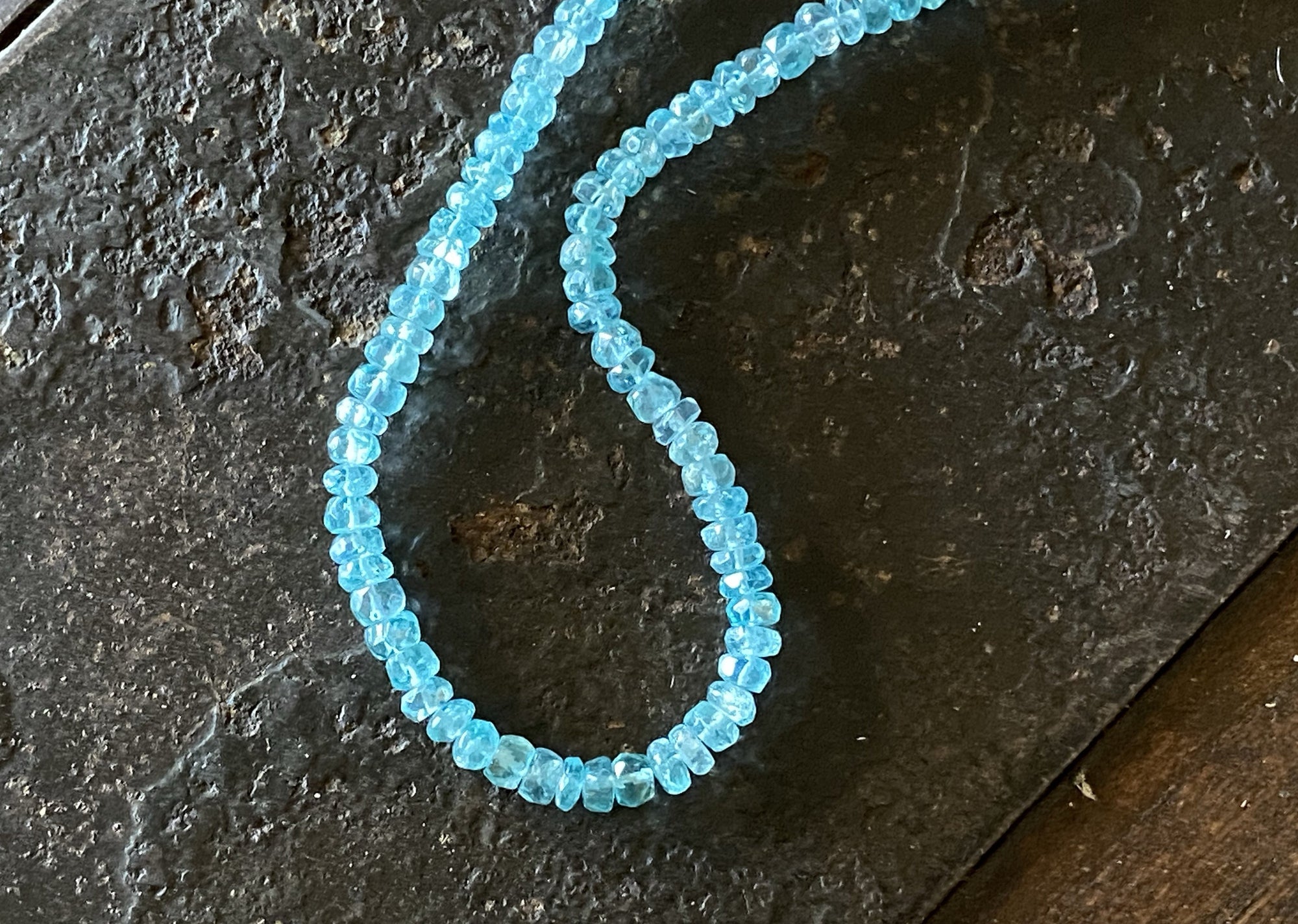 Light blue facet cut apatite bead necklace with sterling silver lobster clasp. The apatite is natural, not dyed or heat treated.