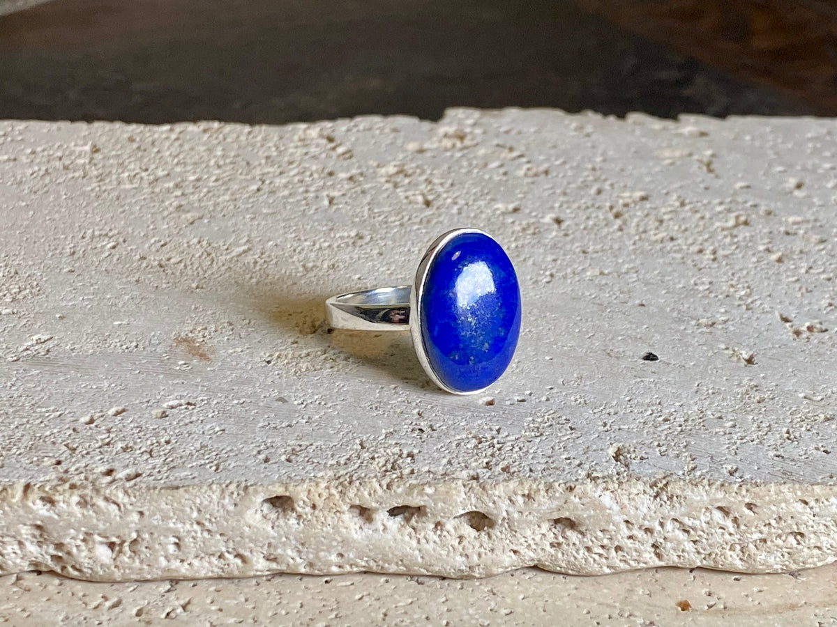 Lapis lazuli stone rings set in sterling silver. Each ring is unique, cut and mounted to showcase the beauty of the individual stones. The lapis is from Afghanistan, completely natural.