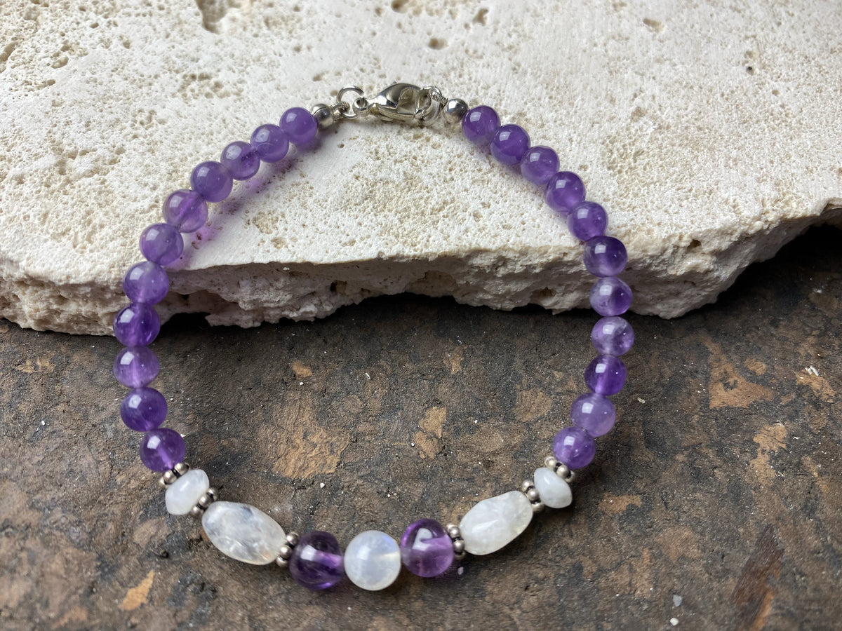 fine beaded bracelet of amethyst and rainbow moonstone, finished with sterling silver detailing and clasp