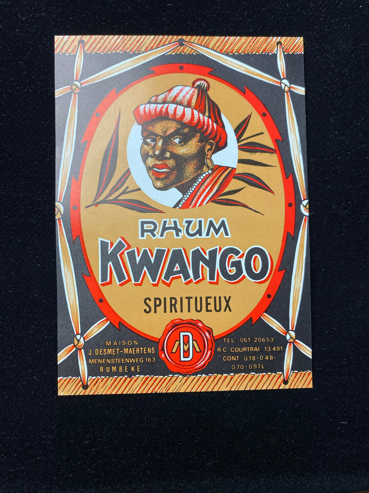 Tiki style with an original bottle label for Kwango Rhum. In mint condition and never used, dating to 1930