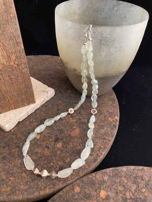 Natural aquamarine bead necklace featuring vintage handmade silver beads. Sterling silver hook and ring clasp findings. 54.1 cm length