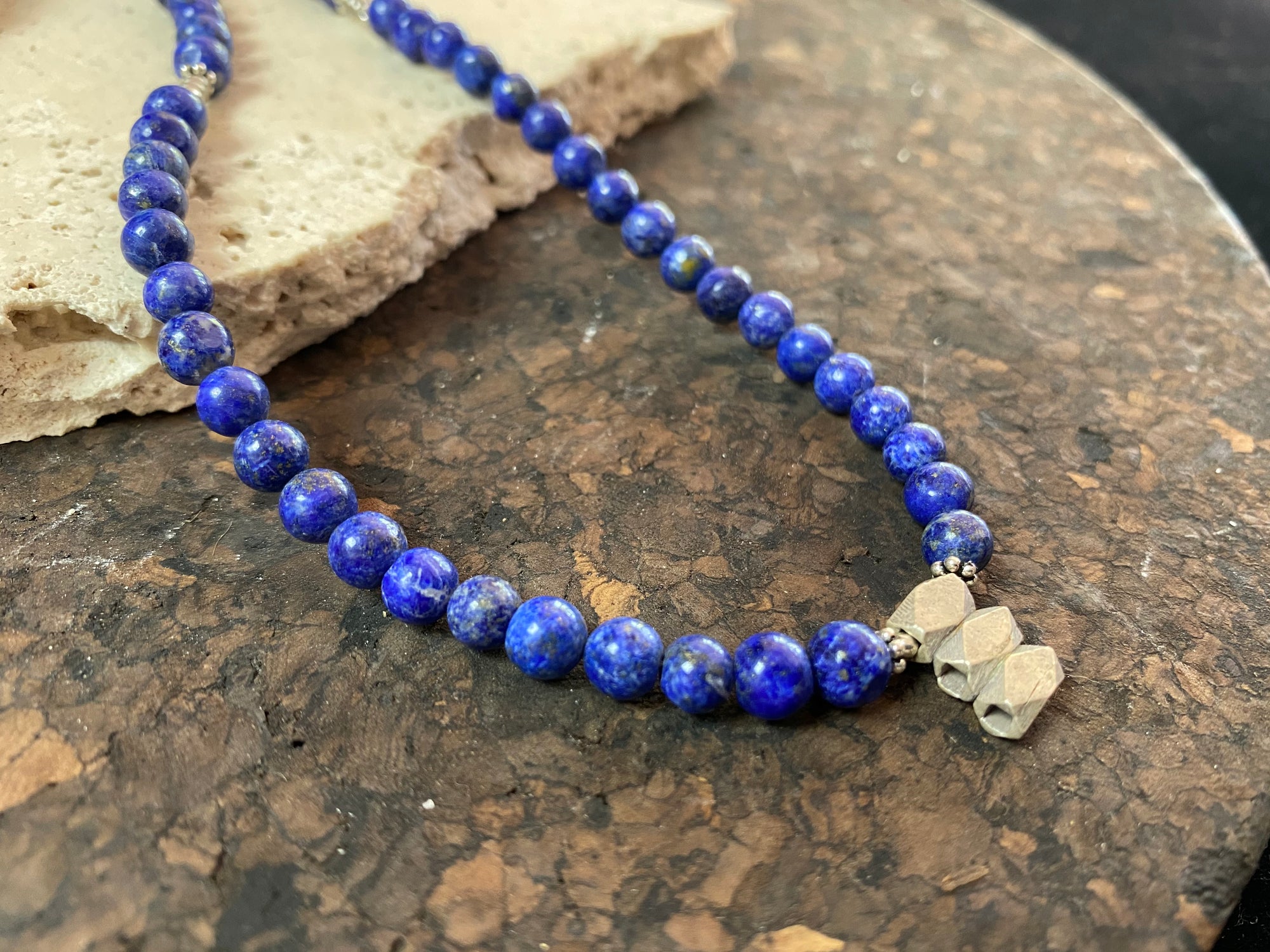 Lapis lazuli bead and silver pendant necklace. Natural lapis and sterling silver or higher grade. 