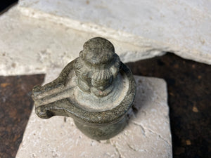 Shiva lighan of the type used in private homes, dating from the early 20th century, hand carved from serpentine, features 4 Shiva heads facing the cardinal points
