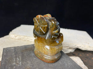 Ganesh statue hand carved from a solid piece of tigers eye stone, 6 cm in height