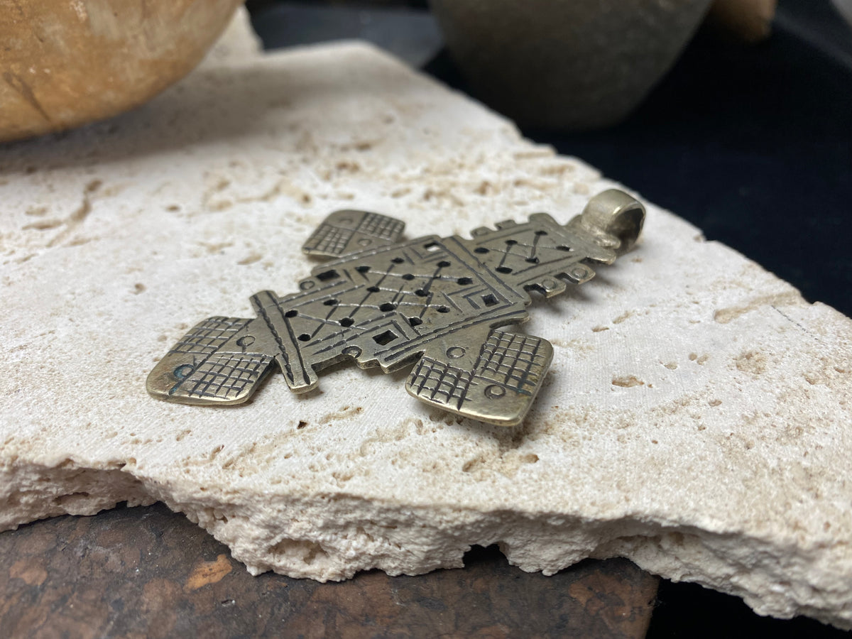 Side view of our large Ethiopian Cross pendant, lost wax casting, non silver, hand made, tribal, gypsy, African jewellery, boho, Christian, bohemian. Length 8.3 cm