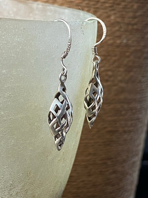 Sterling silver endless knot earrings featuring a 3 dimensional cutout endless knot