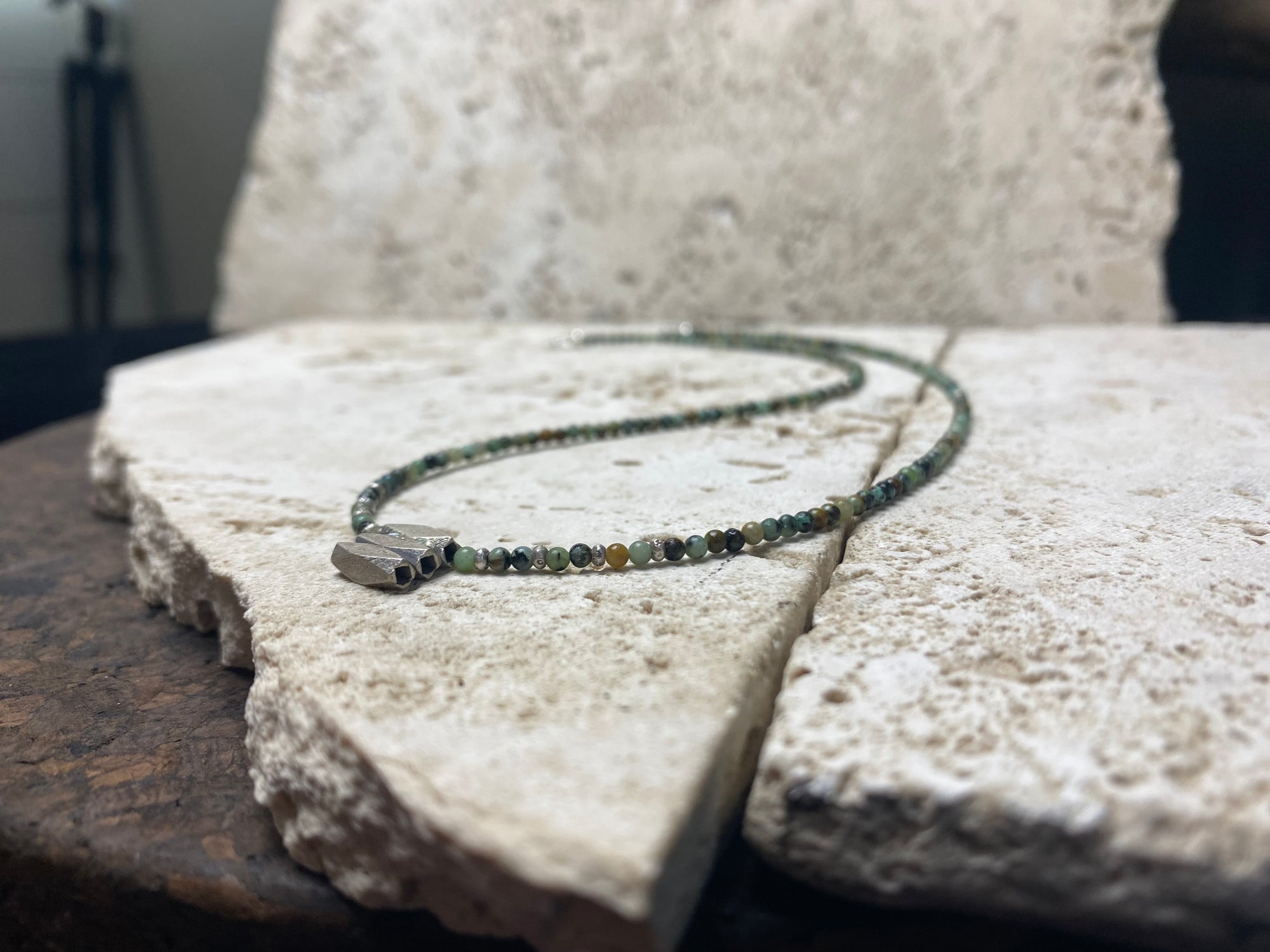 Very fine stone women or mens necklace made from tiny Ethiopian opal beads, highlighted with Karen silver "eye beads" and tribal pendant. The effect is simple, understated and stunning. Finished with sterling silver findings and clasp. A unisex necklace. Length 46.5 cm (18.35")