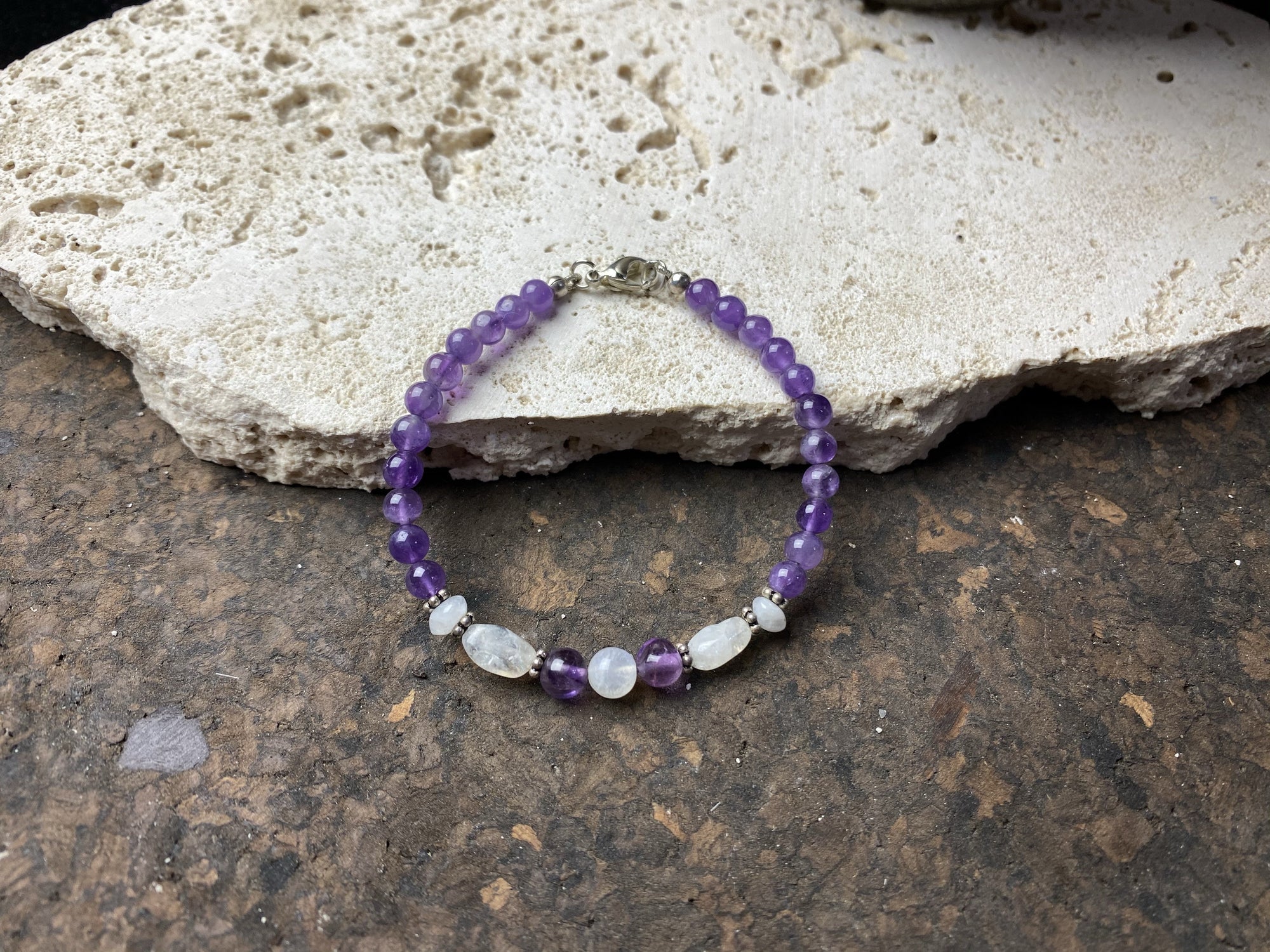 fine beaded bracelet of amethyst and rainbow moonstone, finished with sterling silver detailing and clasp