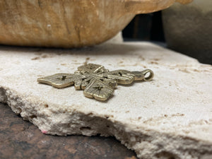 Side view of our pointed style Ethiopian Cross pendant, lost wax casting, non silver, hand made tribal African jewellery, boho, Christian, bohemian. Length 6.2 cm (2.5")