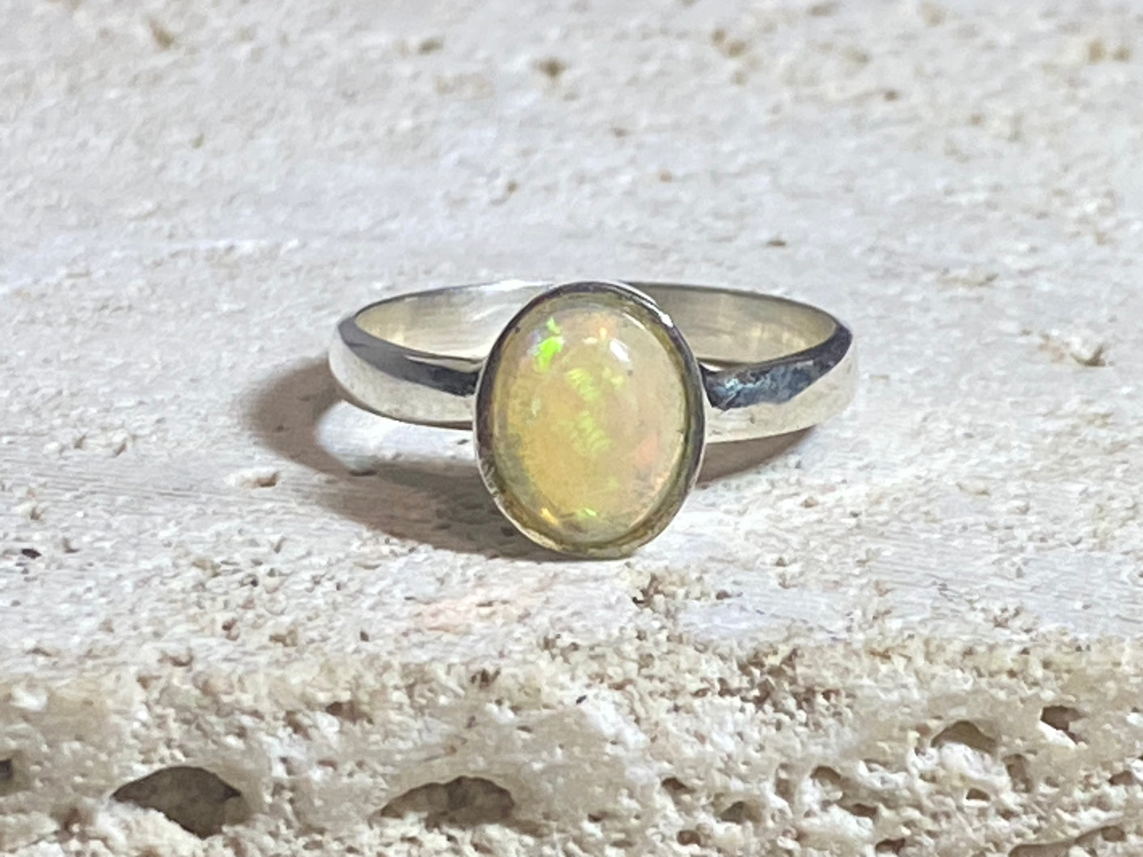 Opal ring set in heavy sterling silver. A stunning, high quality stone with excellent fire. Size 7.75