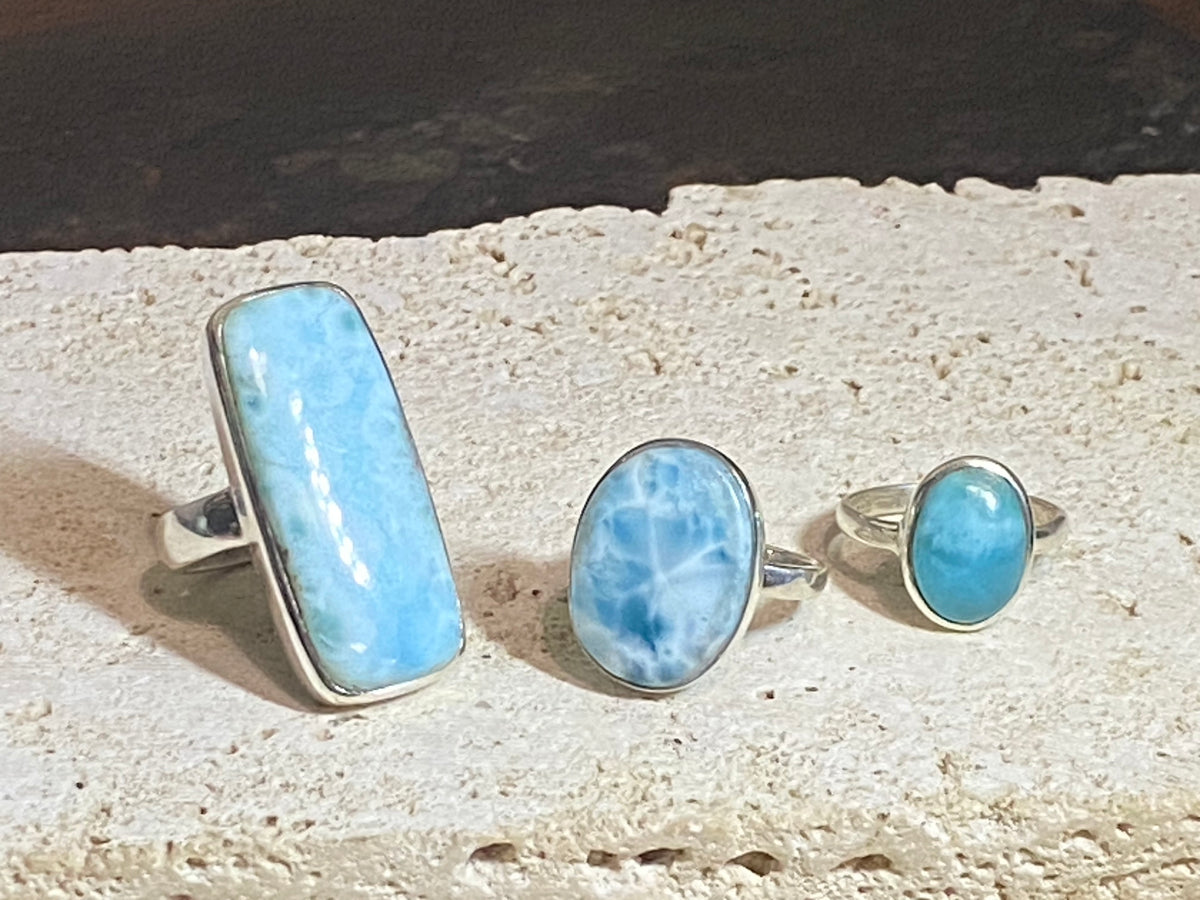 Larimar stone rings set in sterling silver. Each ring is unique, cut and mounted to showcase the beauty of the individual stones.