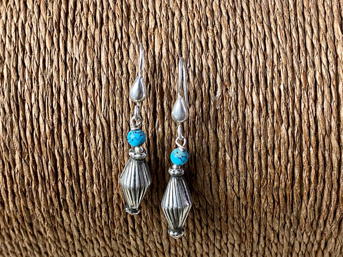 Vintage silver bead from India is teamed up with genuine American turquoise to create a beautiful boho drop earring