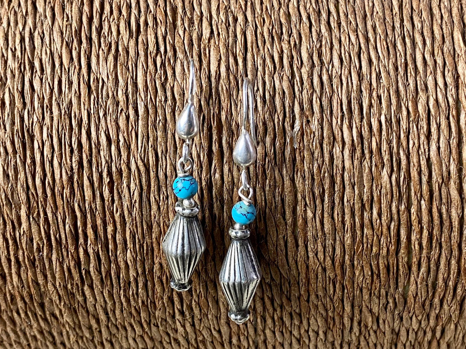 Vintage silver bead from India is teamed up with genuine American turquoise to create a beautiful boho drop earring