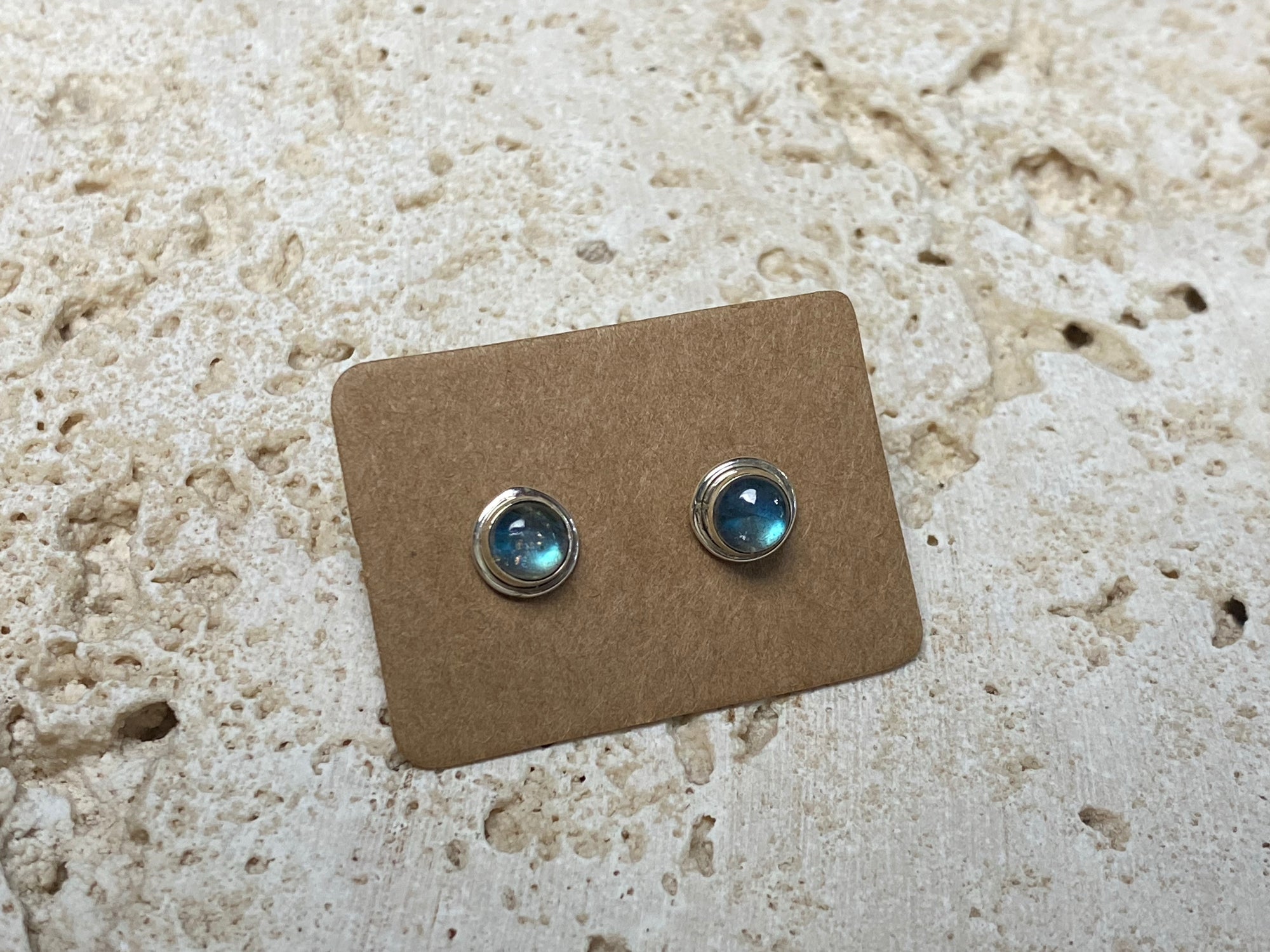 These small labradorite studs are hand made from sterling silver and set with natural labradorite cabochon stones