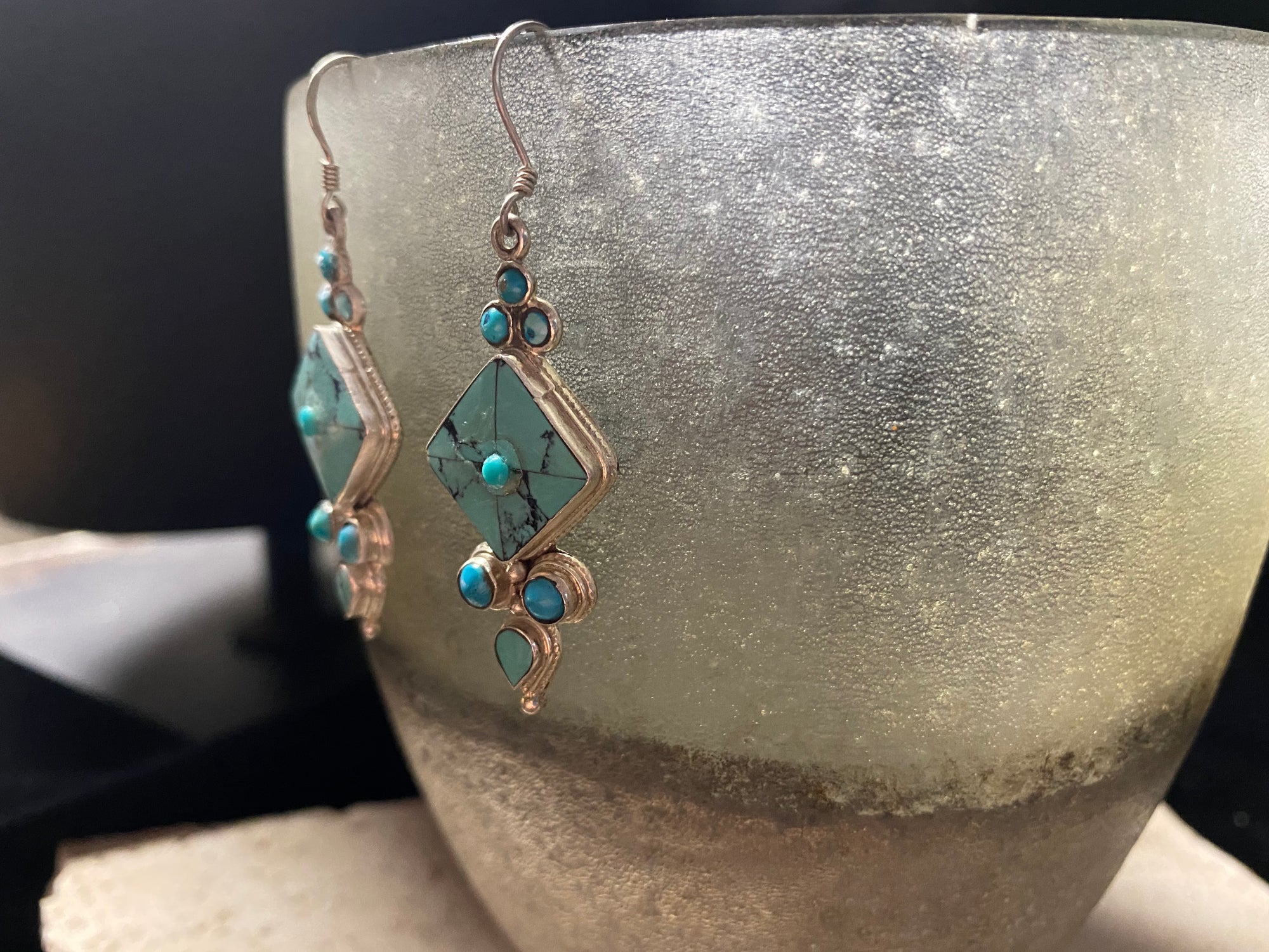 Classic Tibetan earrings, consisting of panels of turquoise set in silver