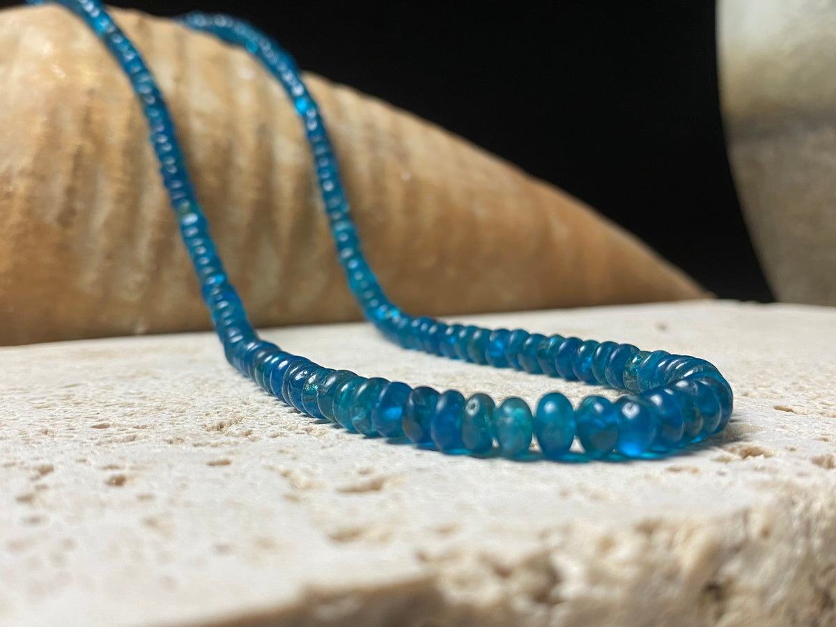 Apatite bead necklace featuring natural cabochon apatite beads graduated and finished with a sterling silver lobster clasp. This is simply stunning and a lovely statement necklace that matches any skin tone or clothing choice. 45 cm length