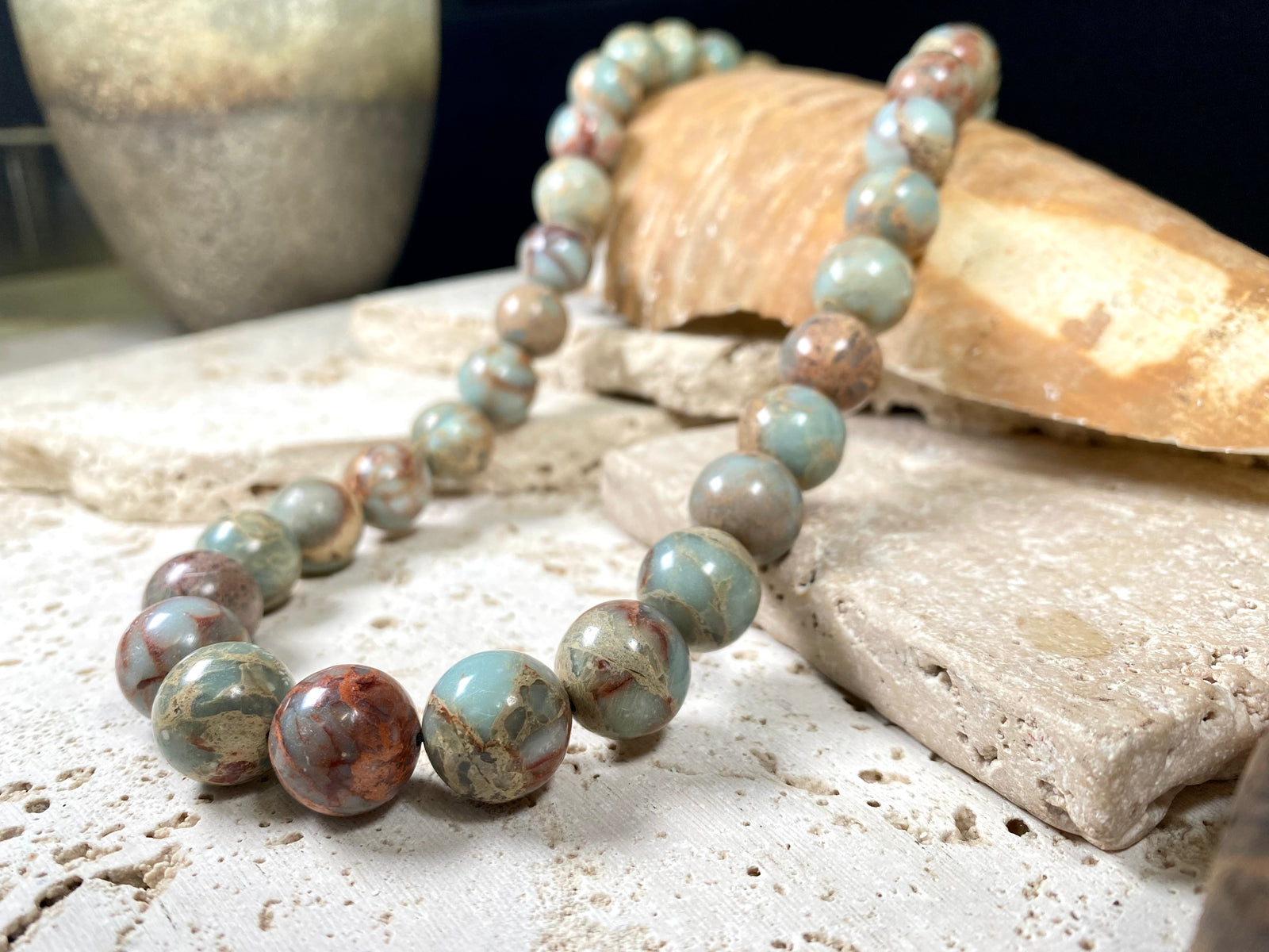 A mid length necklace made from large matched round Ethiopian opal beads, finished with sterling silver findings. Hook clasp. Length 55 cm