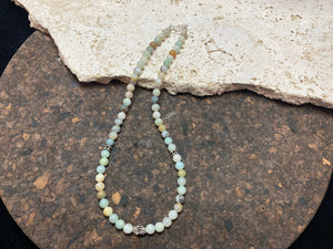 Glowing natural pastel hued graduated quartz beads teamed with sterling silver feature beads and findings