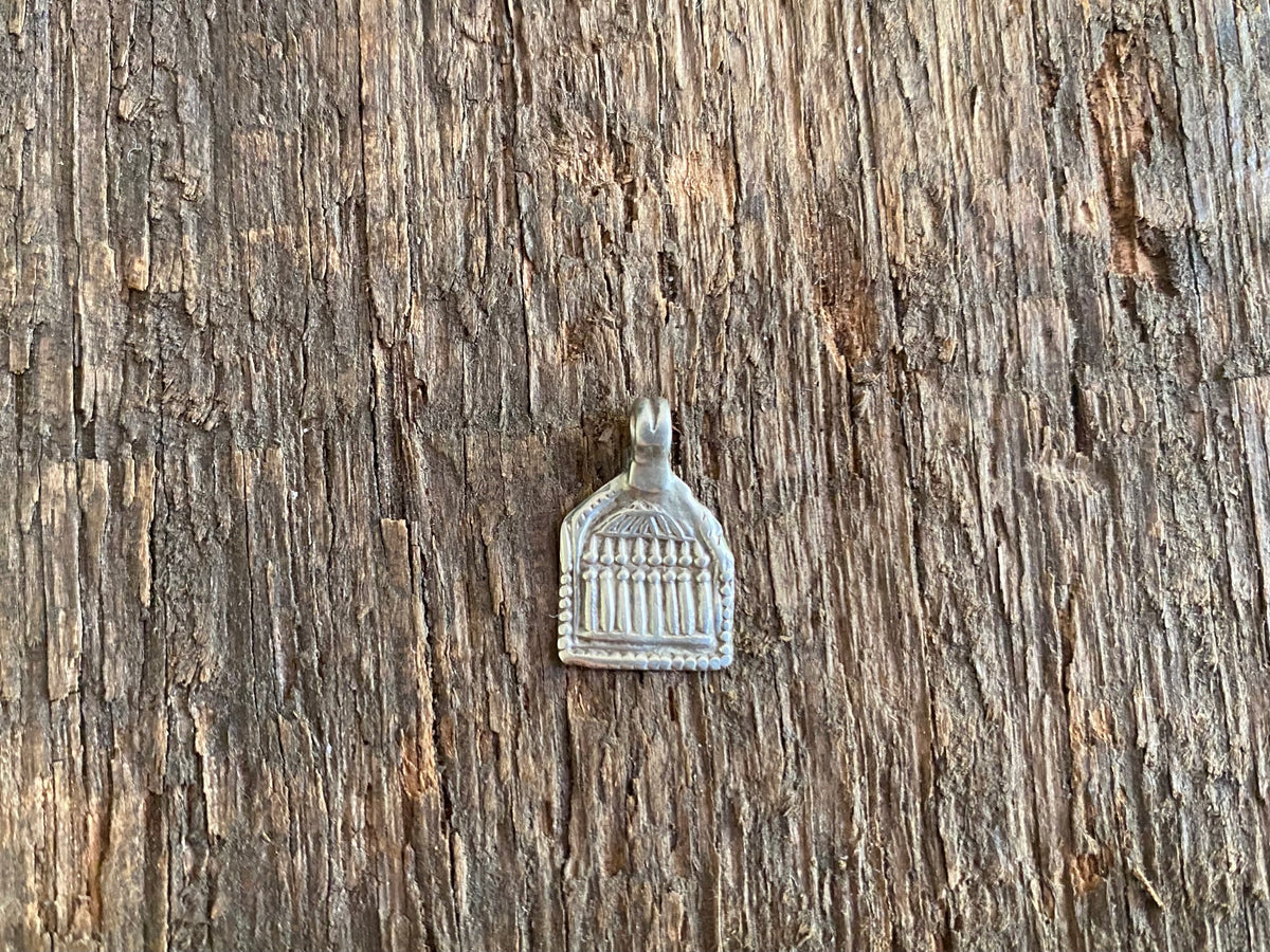 Antique silver amulets representing the Hindu god Skanda and the seven mothers, traditionally worn for protection. Early 19th - early 20th century