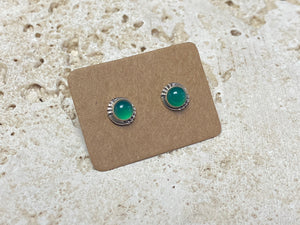 Small chrysoprase earring studs are hand made from sterling silver and set with clear green chrysoprase cabochons. A unisex earring