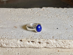 Lapis lazuli stone rings set in sterling silver. Each ring is unique, cut and mounted to showcase the beauty of the individual stones. The lapis is from Afghanistan, completely natural.