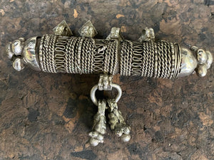 High grade, heavy silver amulet with fused ends, mid 19th century, from Afghanistan. Length 8.5 cm