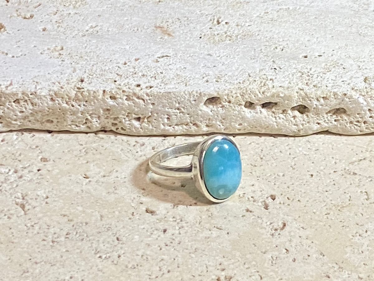 Larimar stone rings set in sterling silver. Each ring is unique, cut and mounted to showcase the beauty of the individual stones.