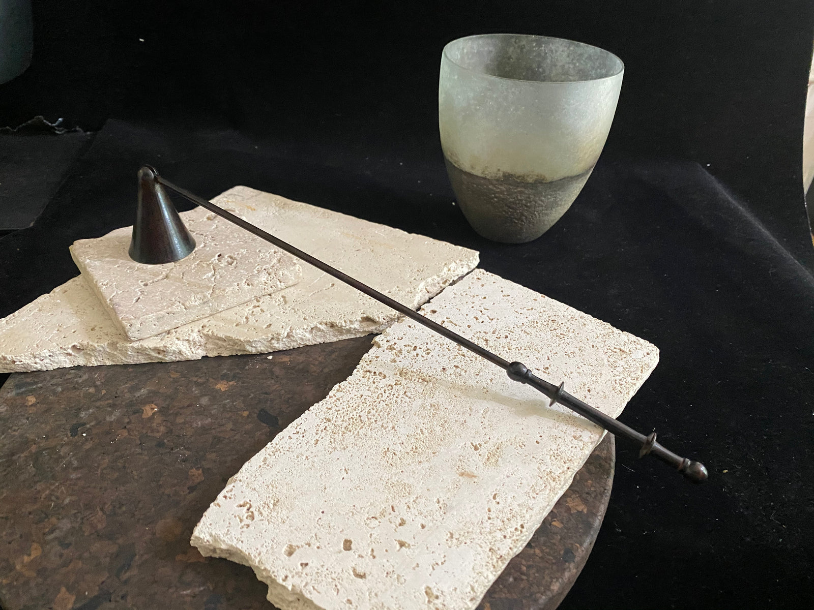 Metal candlesnuffer in bronze finish with a swivel head. Practical and stylish with a comfortable grip and swivel head to allow a candle to be snuffed from all angles. Measurements: 35 cm (13.77") length, stick length 31 cm (12.2)