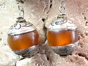 Vintage silver capped amber bead earrings finished with sterling silver in beautiful Boho style. 