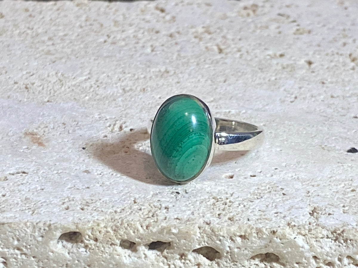 Oval malachite rings set in sterling silver. sizes 7 - 7.5