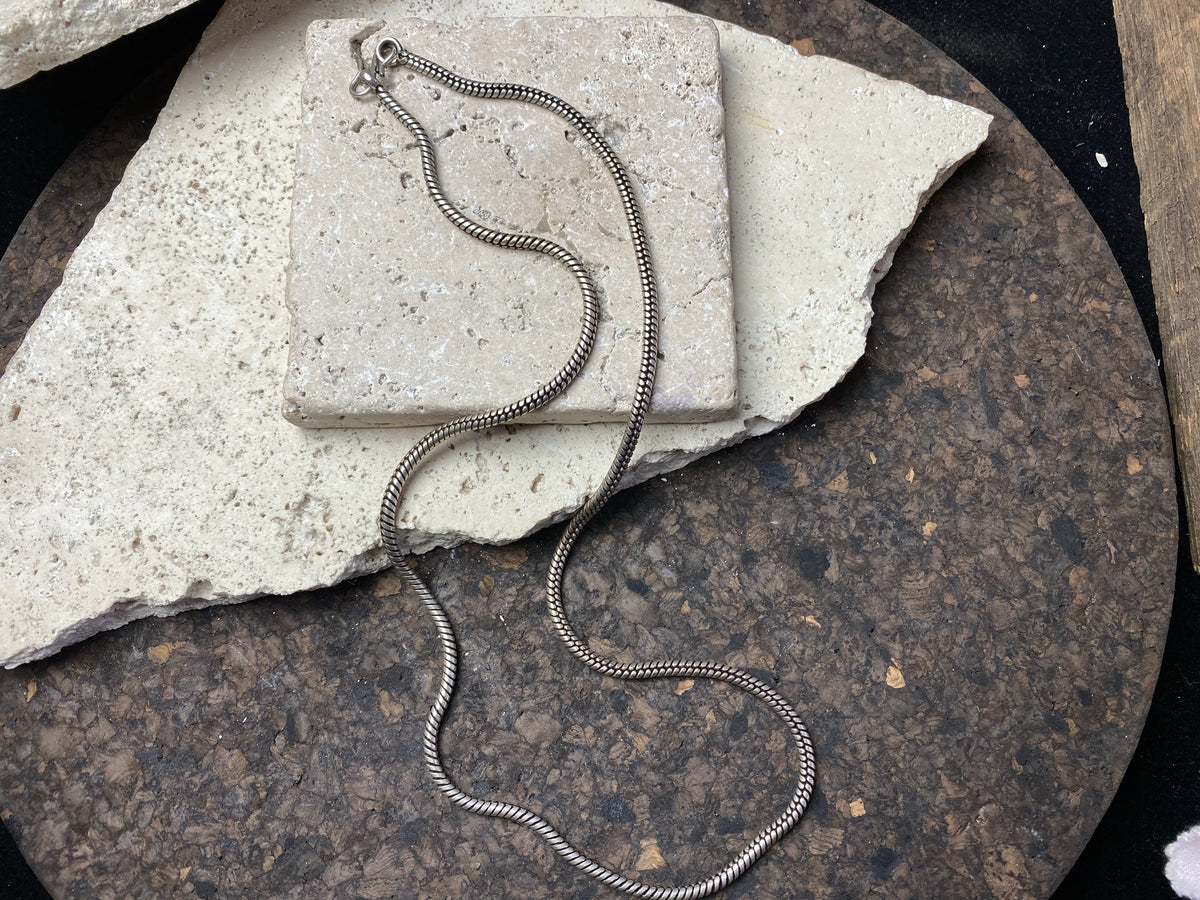 Long open weave non-silver snake chain is heavy and strong, with a dark, oxidised silver finish and S clasp.