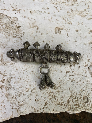 High grade, heavy silver amulet with fused ends, mid 19th century, from Afghanistan. Length 8.5 cm