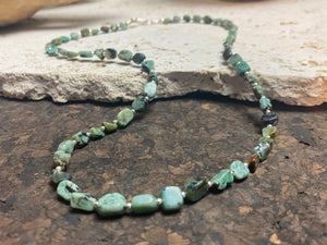 African turquoise boulder necklace with sterling silver bead highlighting