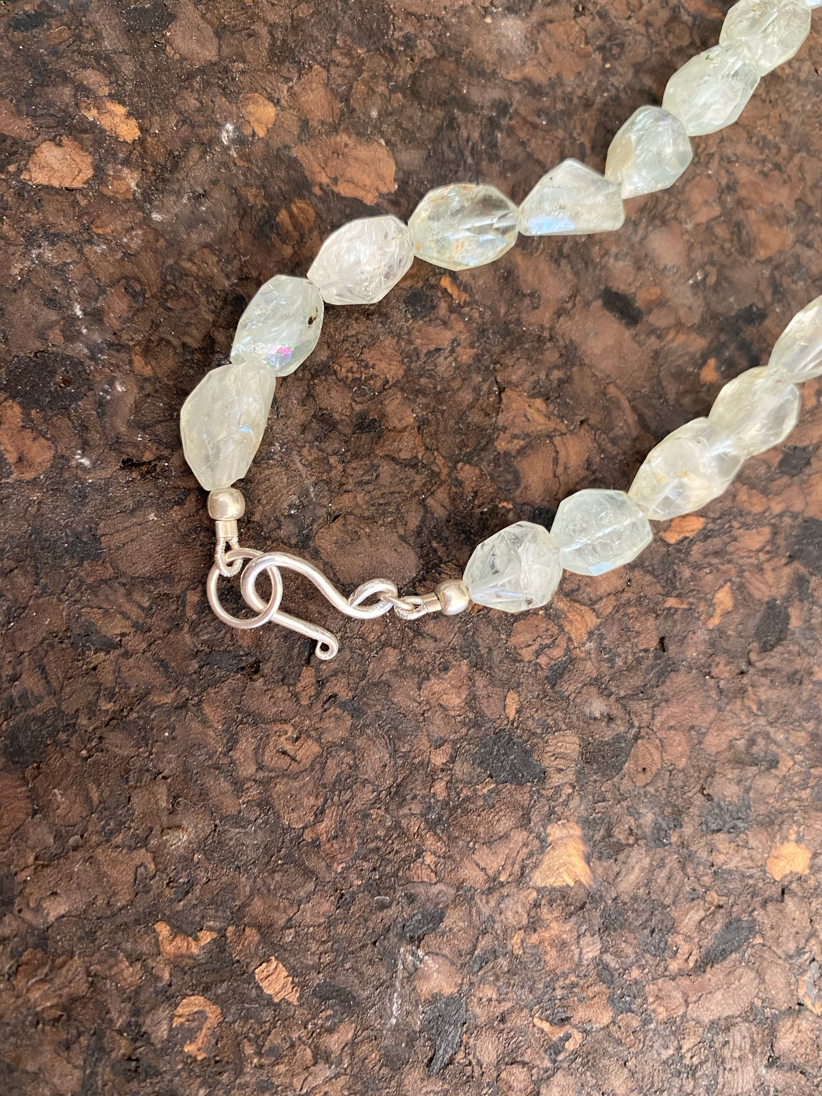 Natural aquamarine bead necklace featuring vintage handmade silver beads. Sterling silver hook and ring clasp findings. 54.1 cm length