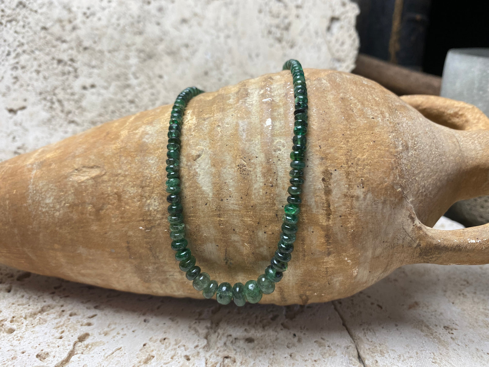 Stunning natural emerald necklace of perfectly drilled and graduated cabochon cut African emeralds finished with a sterling silver hook clasp. Not dyed or heat treated. Premium stringing on jeweller's monofilament. Length 44 cm, 52.6 Ct.