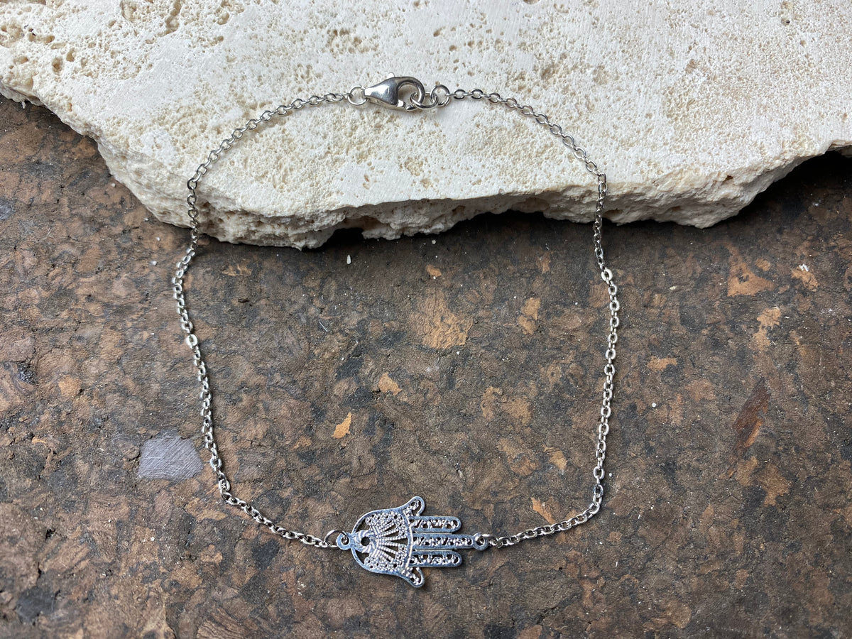 Hamsa anklet features a hamsa pendant on a fine chain and is made from a non-allergenic white metal that looks exactly like silver and will not ever tarnish, rust or wear