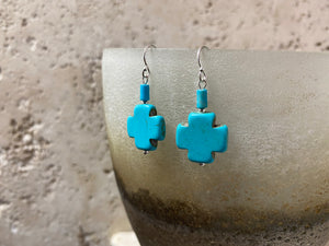 Striking cross earrings are hand crafted from sterling silver and blue dyed howlite stone, giving a southwest earring vibe without the price of real turquoise. Two styles, 3 or 3.5 cm length
