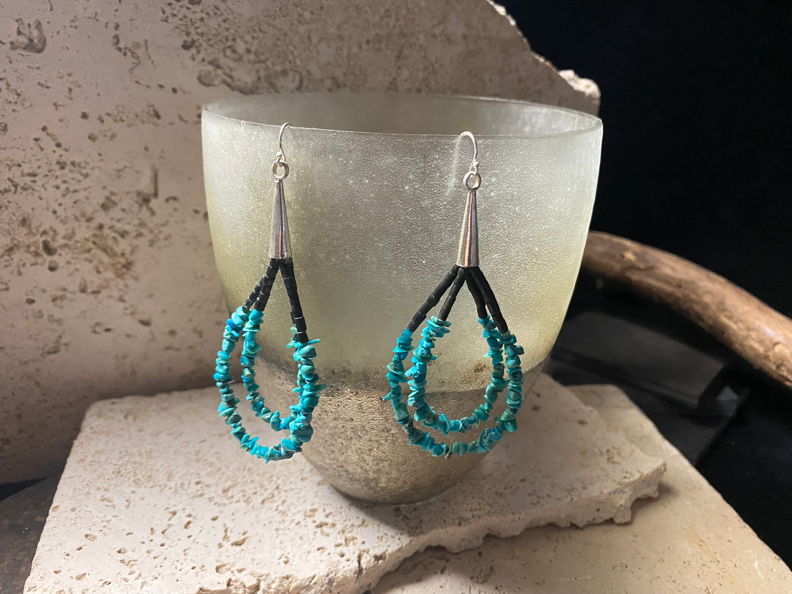 Beautiful southwest earrings made from turquoise chips and black serpentine stone, finished with sterling silver caps and hooks. Length 8.5 cm