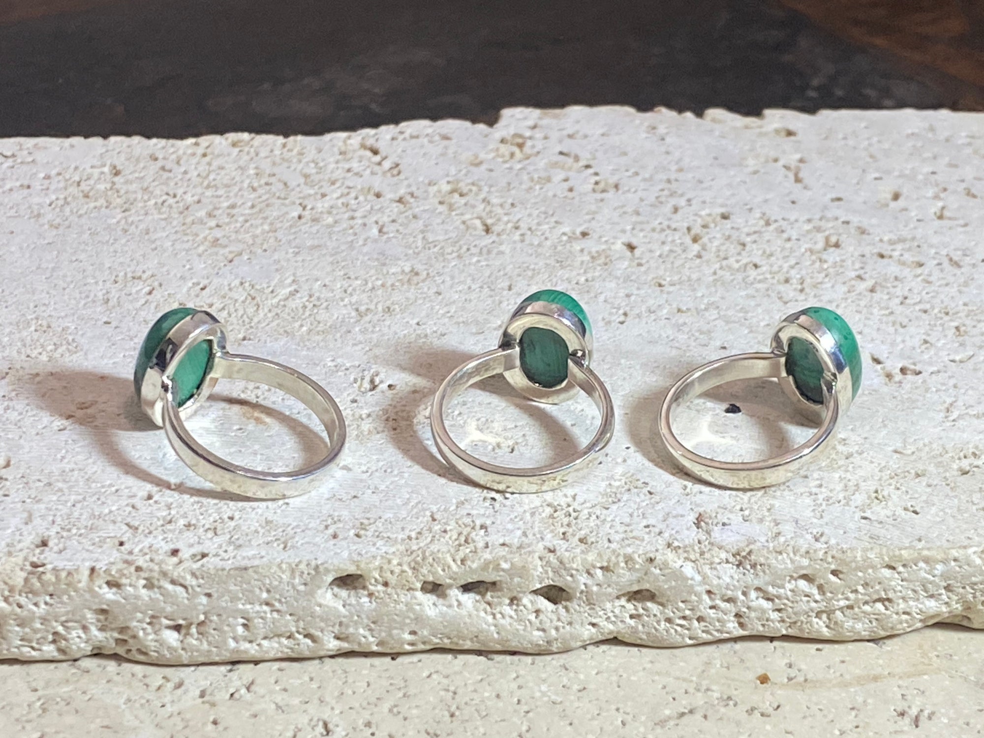 Oval malachite rings set in sterling silver. sizes 7 - 7.5