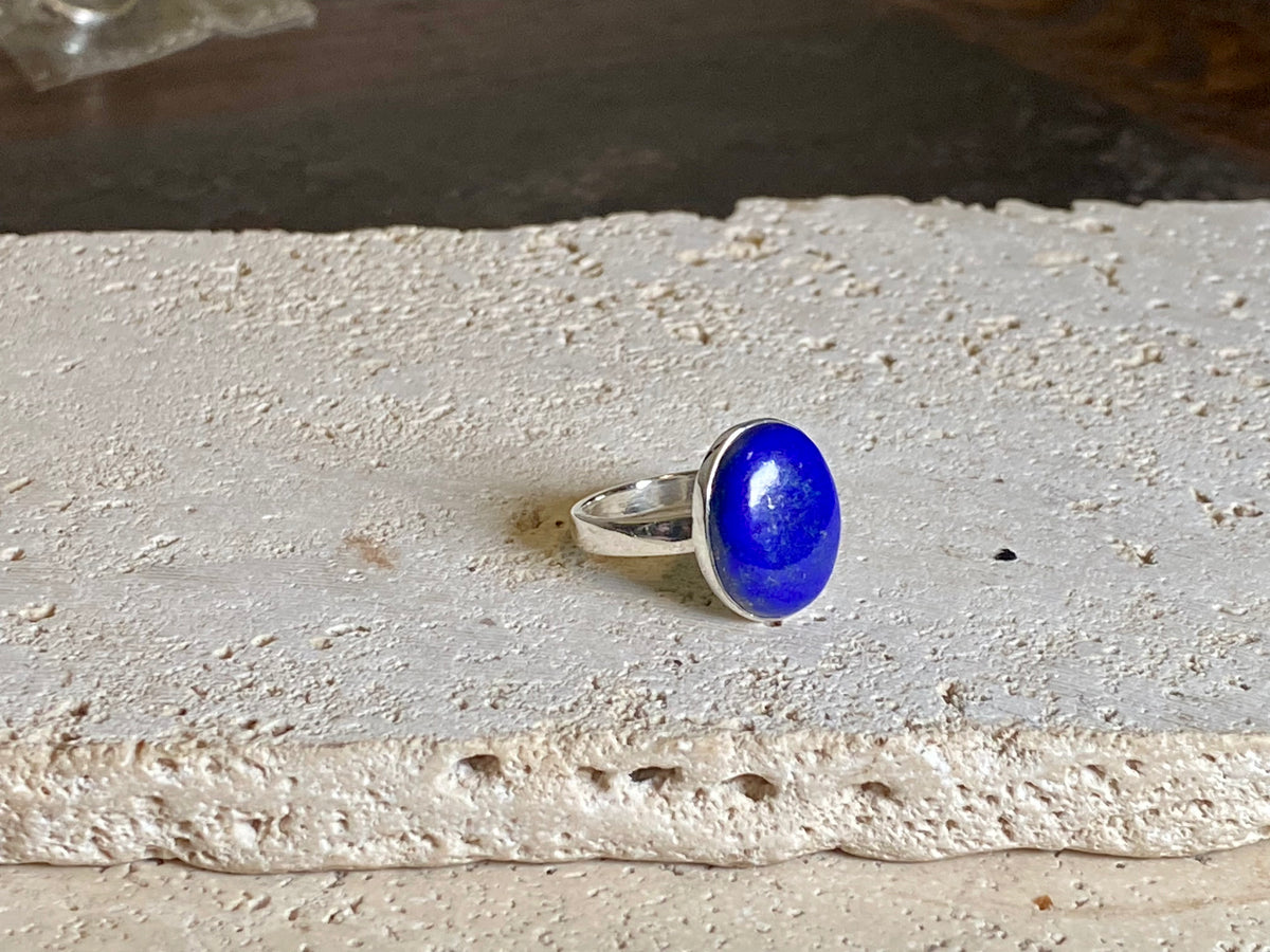 Lapis lazuli stone rings set in sterling silver. Each ring is unique, cut and mounted to showcase the beauty of the individual stones. The lapis is from Afghanistan, completely natural.