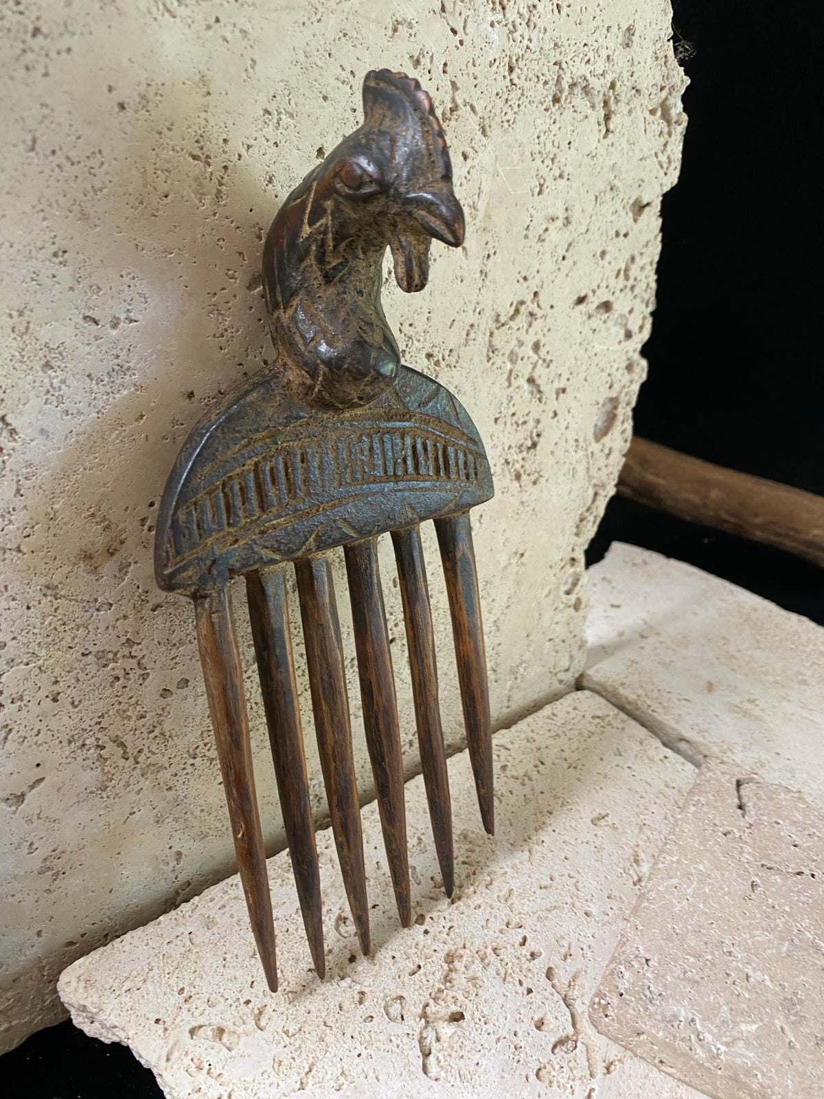 These wood box combs are used to comb the hair and for adornment. Decorative combs may be obtained as gifts or presented to them at marriage. Our combs originate in Ghana and are vintage (pre 1980). All combs have minor wood damage, irregularities and marks. Approximately 18 cm length (6.75")