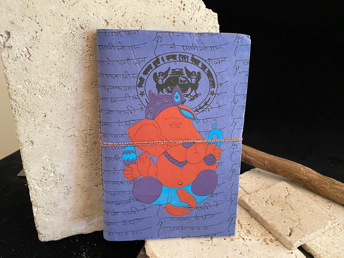 Eco-friendly journals, the perfect size at 25 x 17 cm (10 x 6.75"). Filled with handmade recycled paper and covered in bright, printed covers. Excellent for use as a journal, writer's notebook, scrapbook, travel diary or notebook.