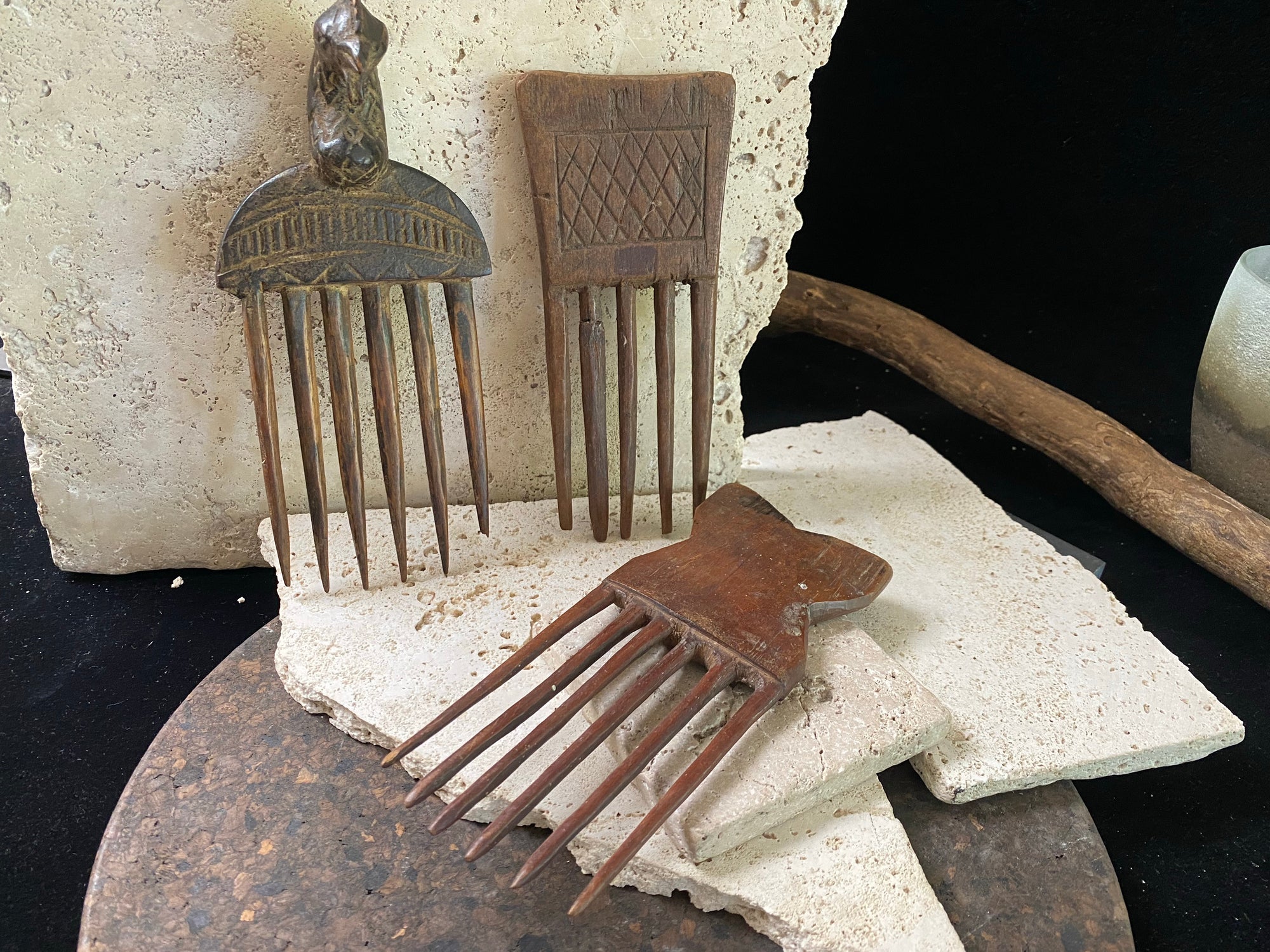 These wood box combs are used to comb the hair and for adornment. Decorative combs may be obtained as gifts or presented to them at marriage. Our combs originate in Ghana and are vintage (pre 1980). All combs have minor wood damage, irregularities and marks. Approximately 18 cm length (6.75")